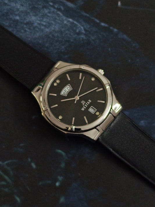 Westar Quartz Day Date Watch with a Black Dial