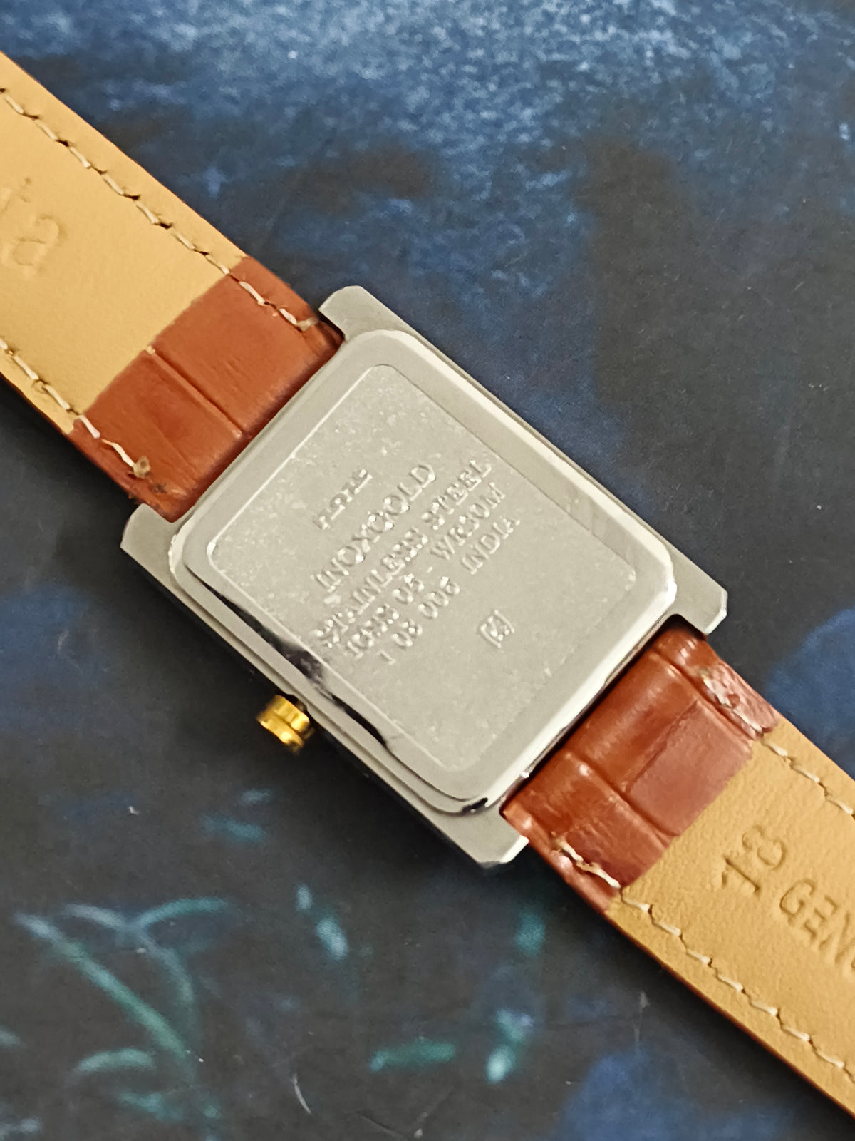 HMT INOX Quartz Tank Watch with a Champagne-toned Dial