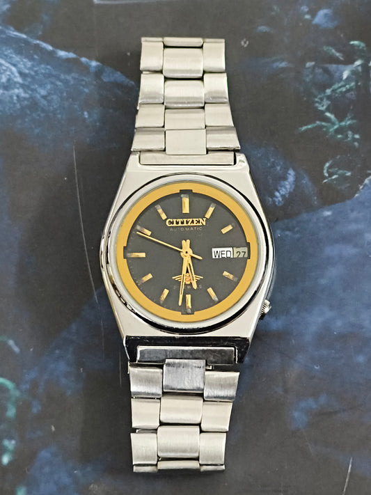 Citizen Vintage Automatic Day Date Watch with a Black Dial and Golden Details