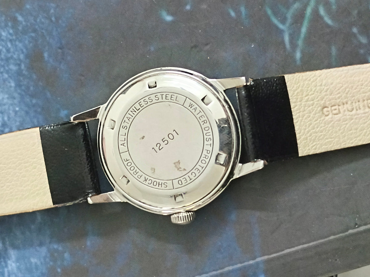 HMT Tarun Mechanical Hand-Wound Vintage Watch with a Notebook Vertical Line Dial