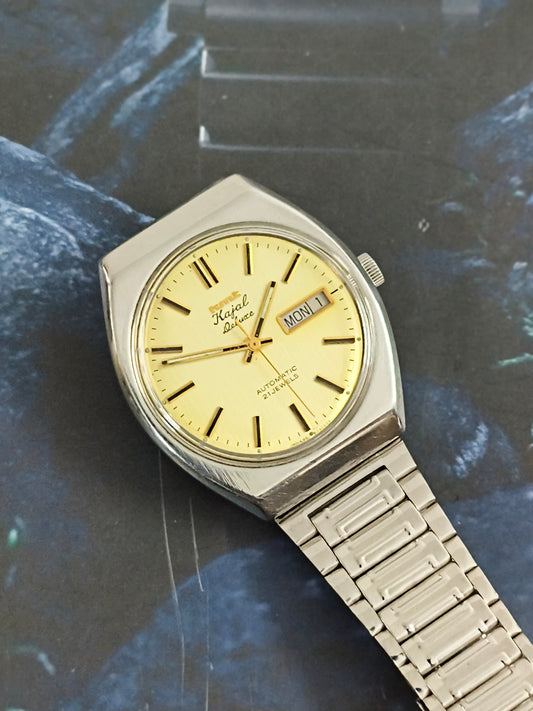 HMT Kajal Deluxe Automatic Day Date Vintage Watch with a Textured Golden Dial