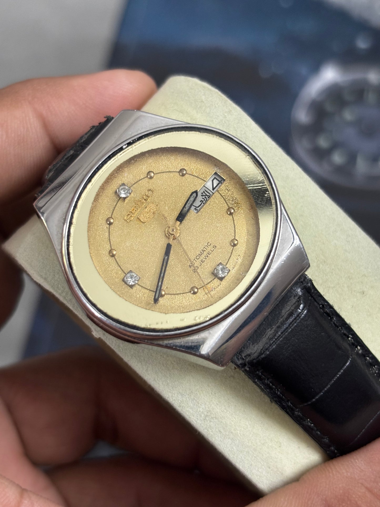 Seiko 5 Automatic Vintage Day Date Watch with an Oval-shaped Face and Golden Dial