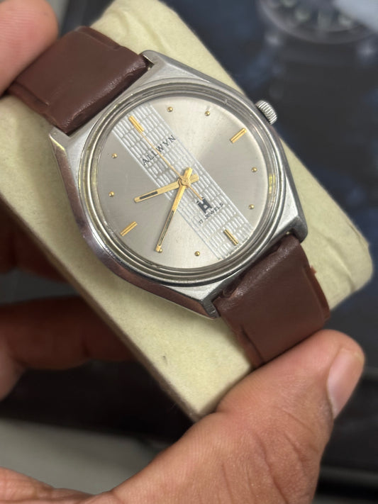 Allwyn Vintage Hand-wound Watch with a Two Tone Dial and Vertical Stripe Decoration