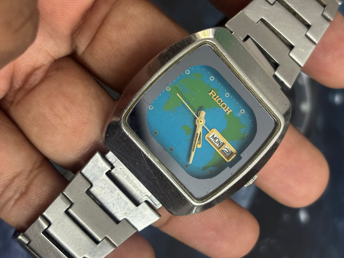 Ricoh Vintage Automatic Day Date Watch with a Blue & Green Map Dial