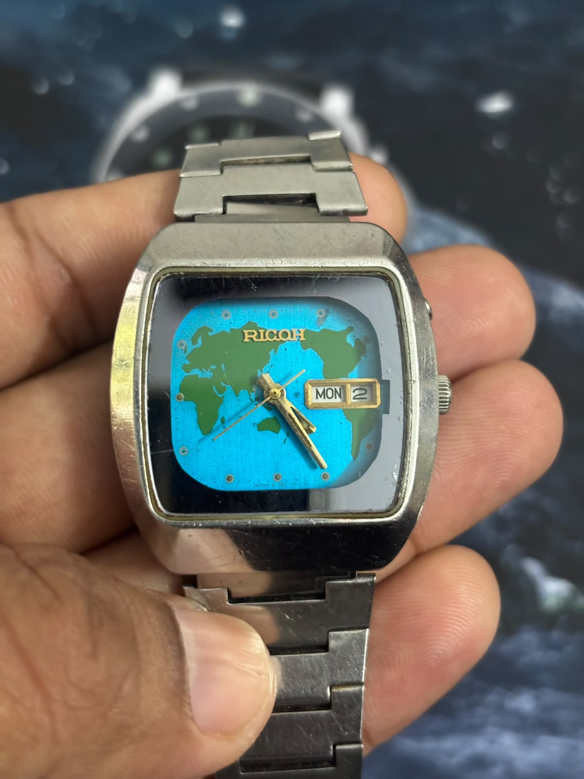 Ricoh Vintage Automatic Day Date Watch with a Blue & Green Map Dial