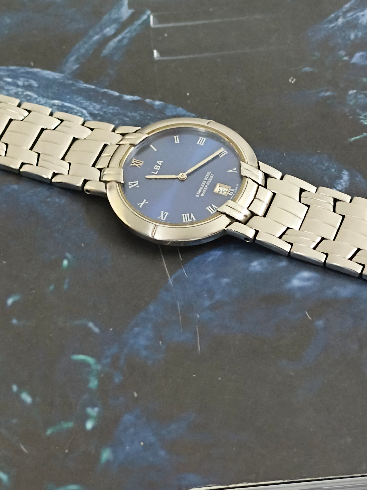 ALBA Quartz Ultra-thin Watch with a Midnight Blue Sunburst Dial