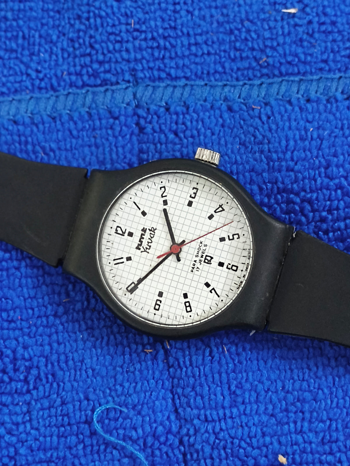 HMT Yuvak Hand-wound Vintage Watch with a Black Resin Case and White Graph Dial