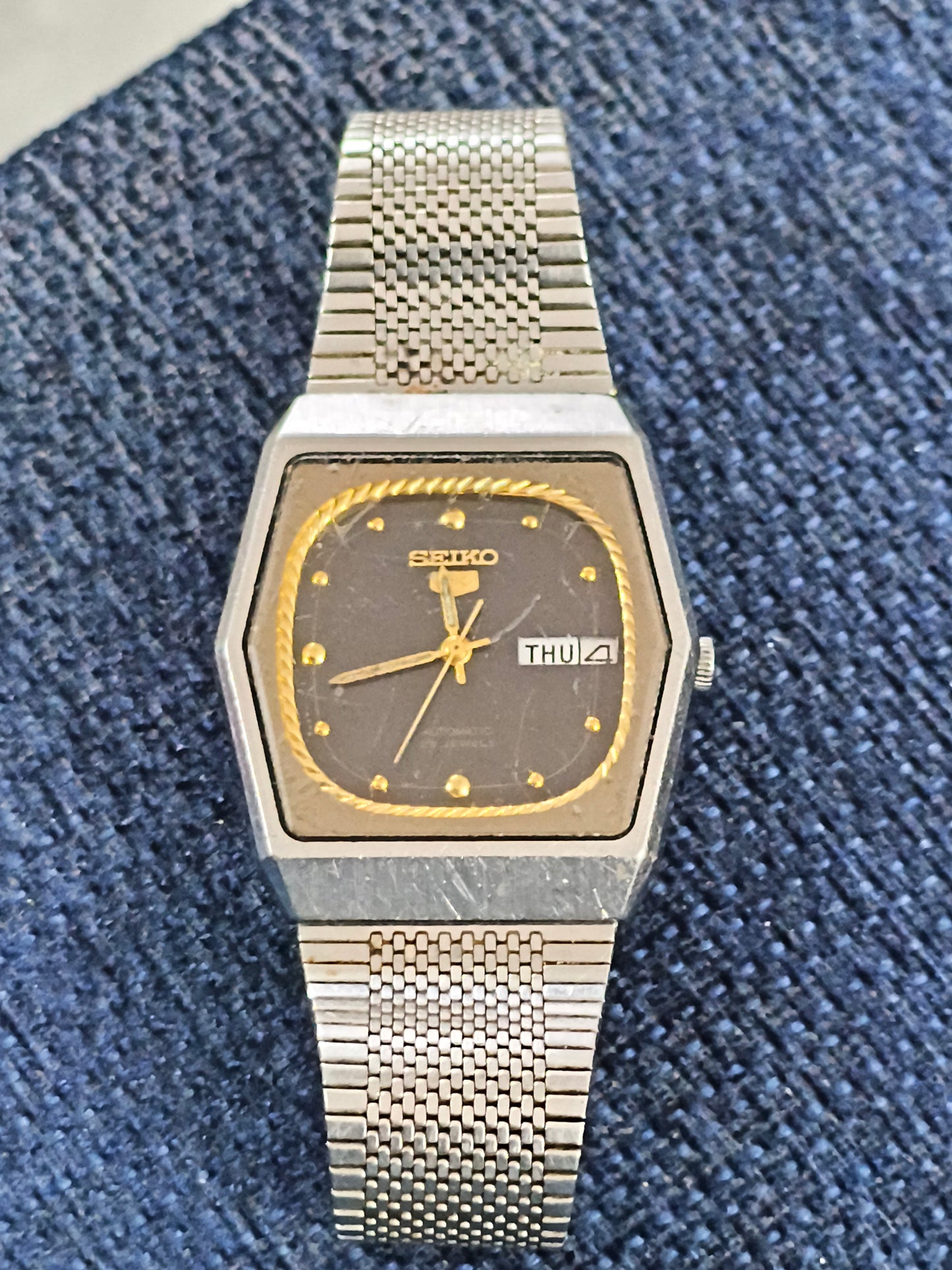Seiko 5 Automatic Day Date Vintage Watch with a Black Dial and Golden Border