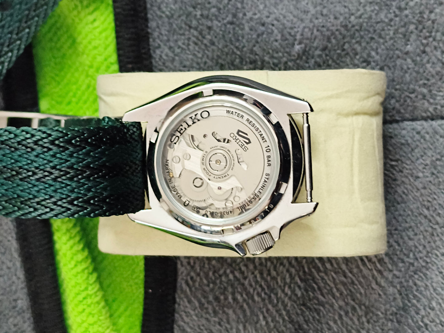 Seiko 5 Sports SKX Series Model SRPE65 with a Green Dial and Matching NATO Strap