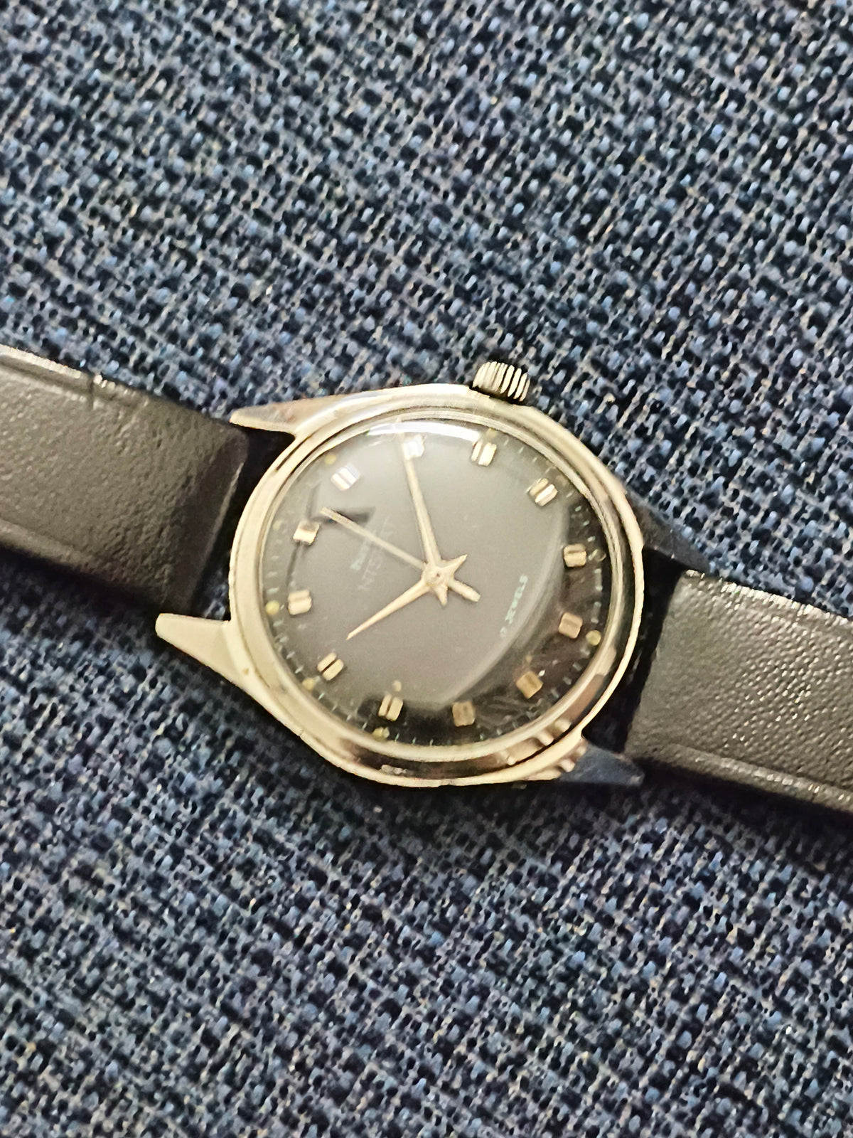 HMT Nishat Hand-wound Vintage Watch with a Black Dial and Brick Indices