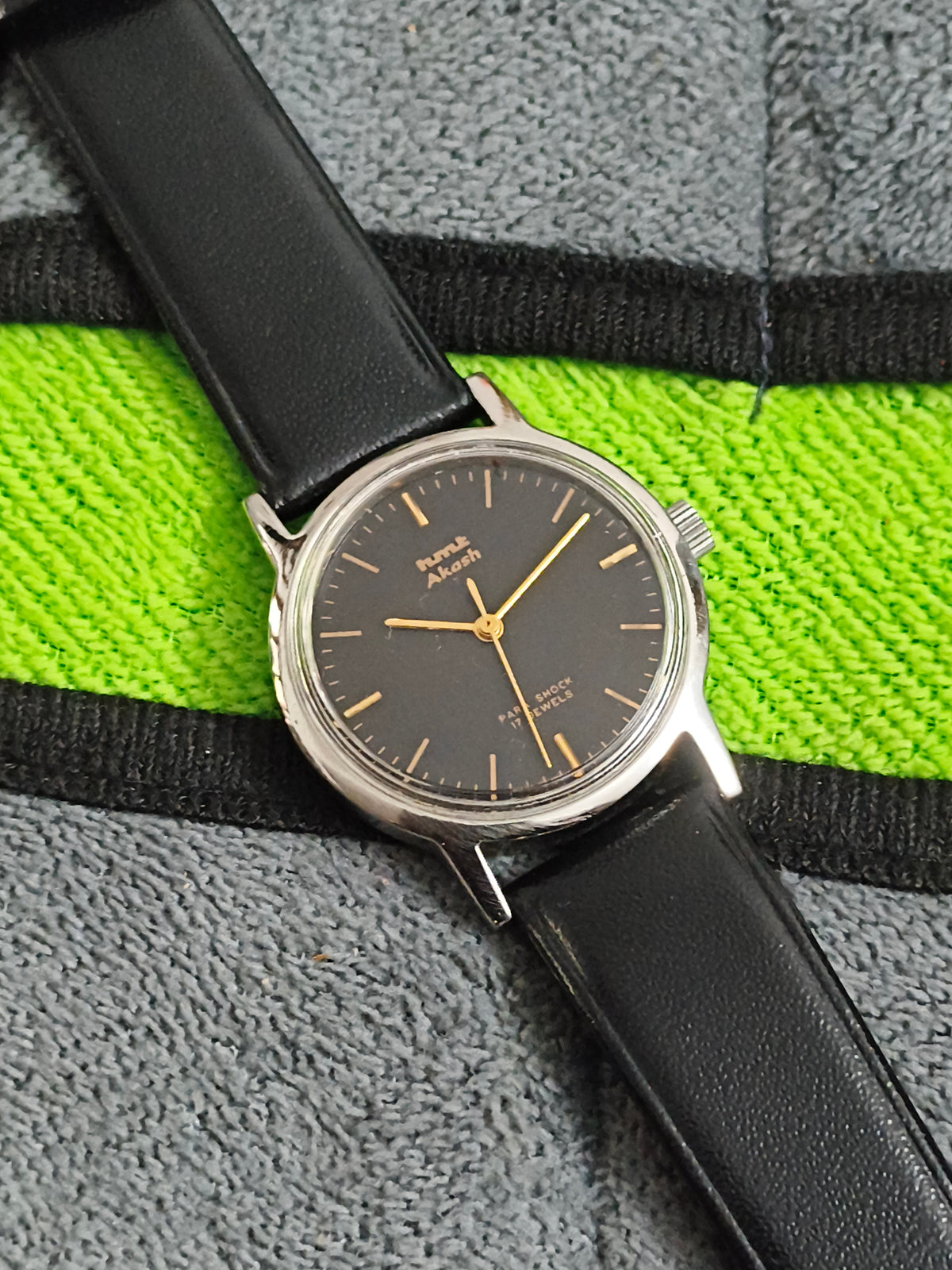 HMT Akash Hand-wound Vintage Watch with a Black Dial and Golden Details