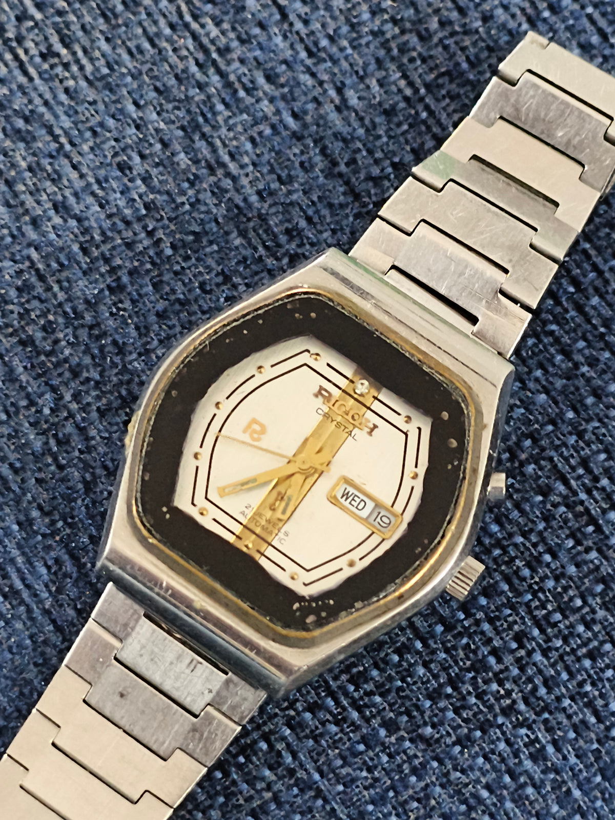 Ricoh Automatic Day Date Vintage Watch with Silver-toned Dial and Golden Vertical Stripes