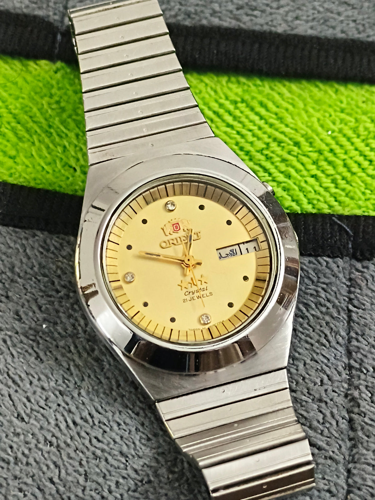 Orient Neo-Vintage Automatic Day Date Watch with a Gold-toned Dial