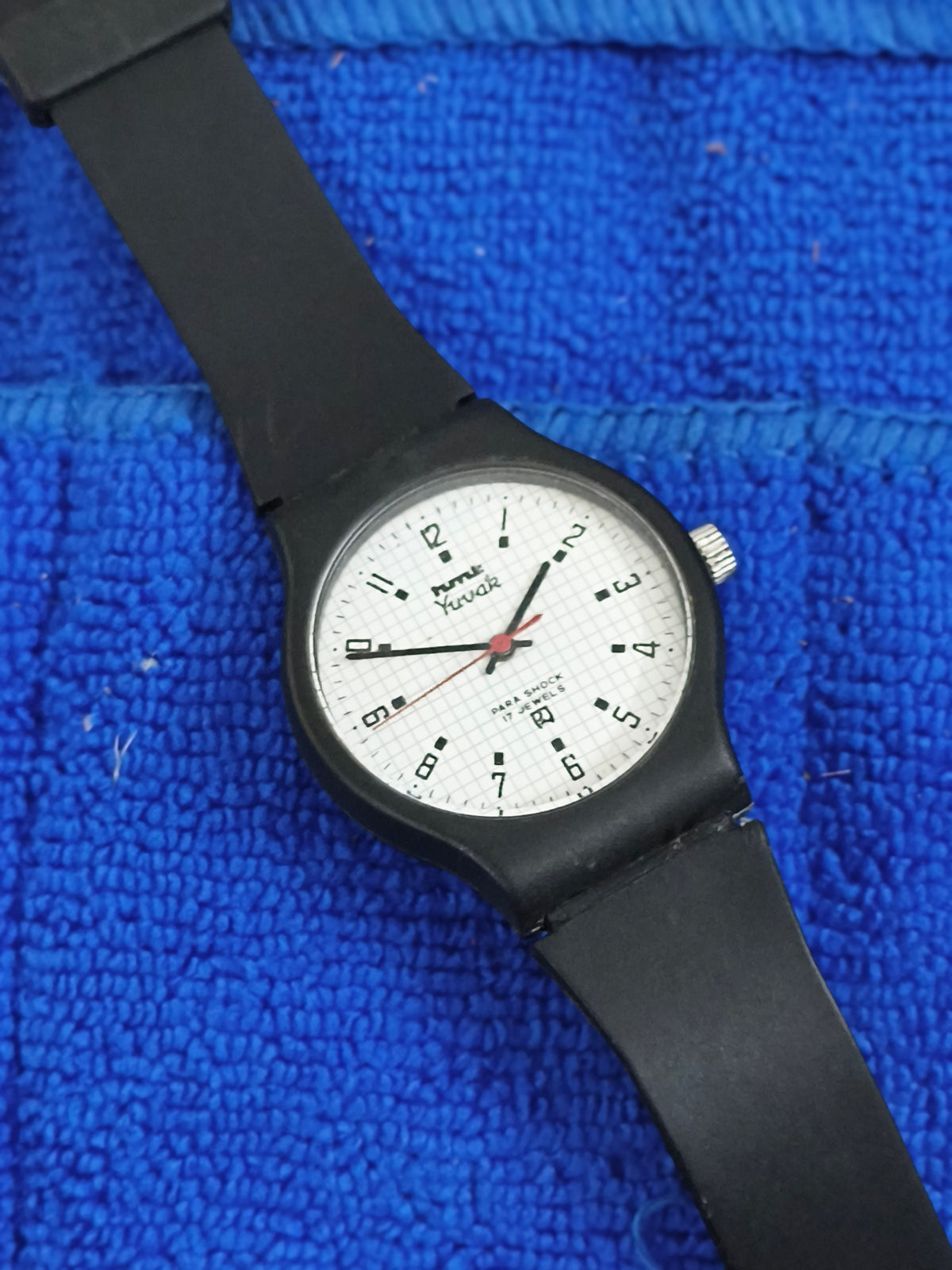 HMT Yuvak Hand-wound Vintage Watch with a Black Resin Case and White Graph Dial