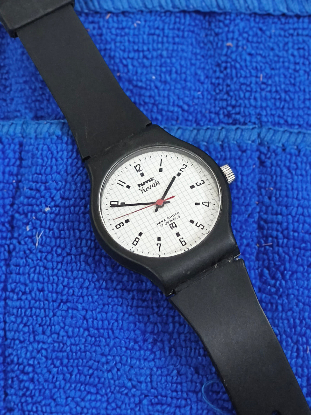 HMT Yuvak Hand-wound Vintage Watch with a Black Resin Case and White Graph Dial