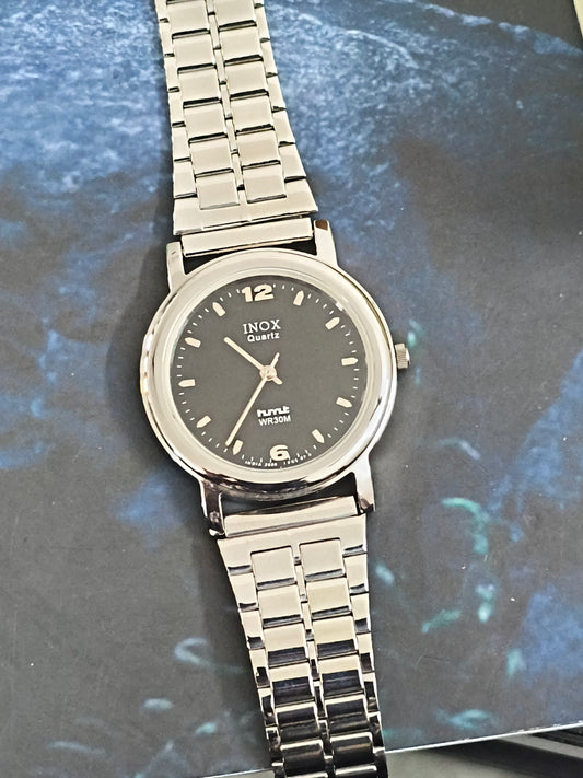 HMT INOX Quartz 35mm Watch with a Black Dial