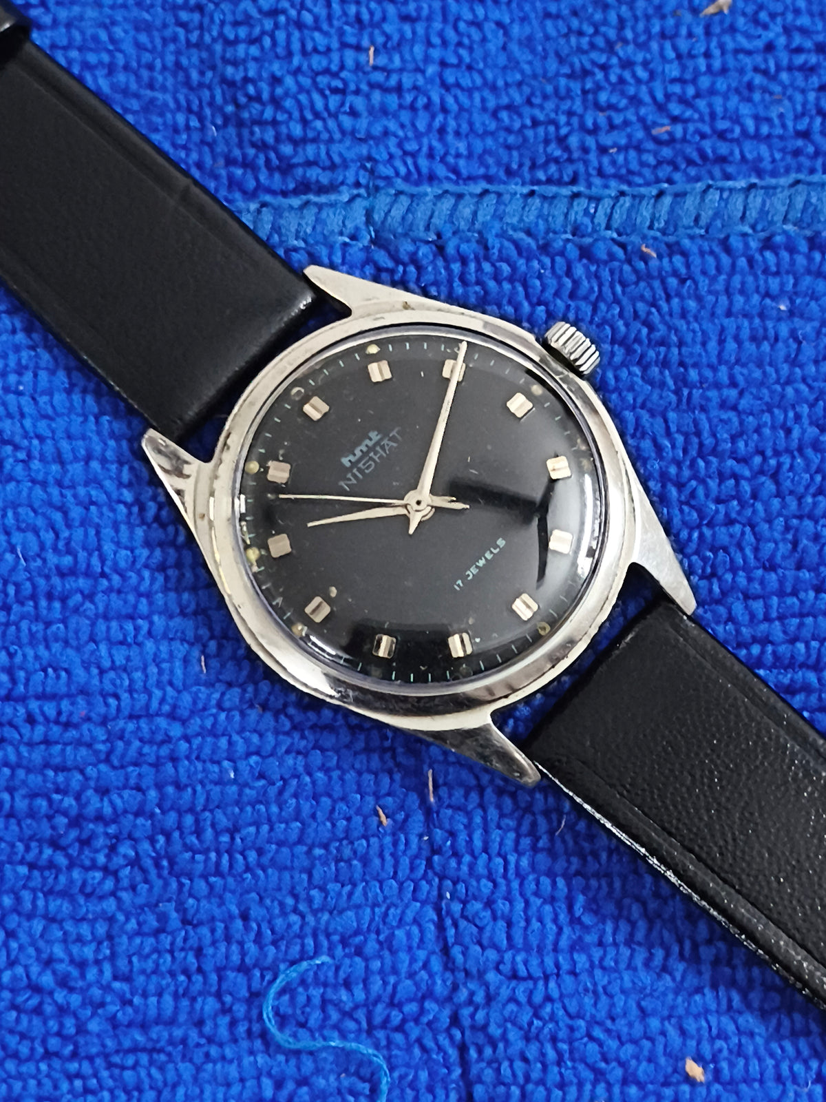 HMT Nishat Hand-wound Vintage Watch with a Black Dial and Brick Indices