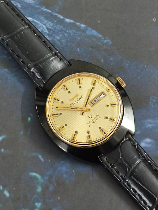 HMT Kajal Automatic Day Date Vintage Watch with a Textured Golden Dial