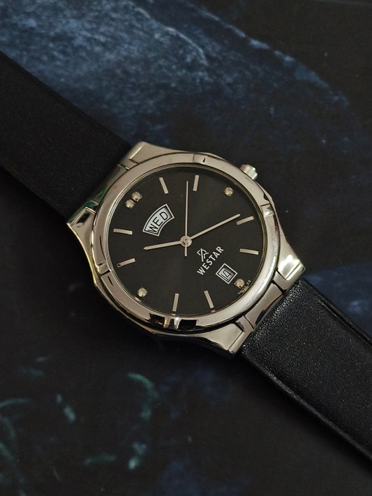 Westar Quartz Day Date Watch with a Black Dial