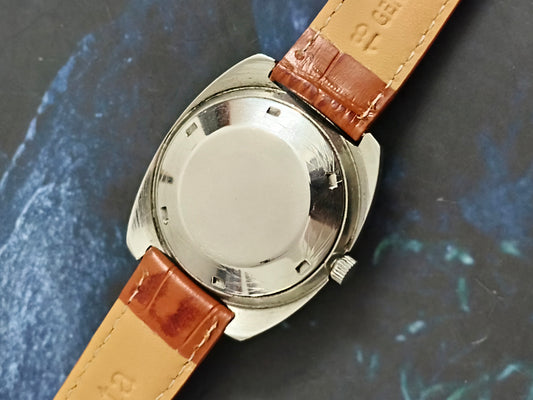 Favre Leuba Duomatic Vintage Watch with a Cream-colored Patina Dial