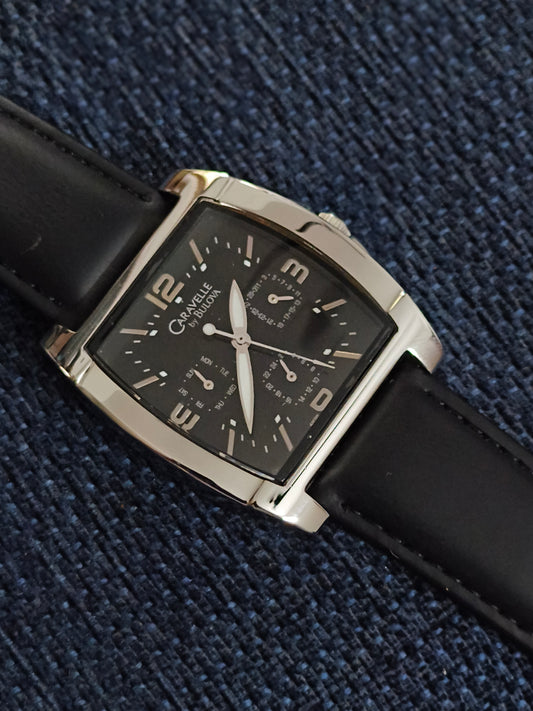 Caravelle by Bulova Multifunction Quartz Watch with a Black Dial
