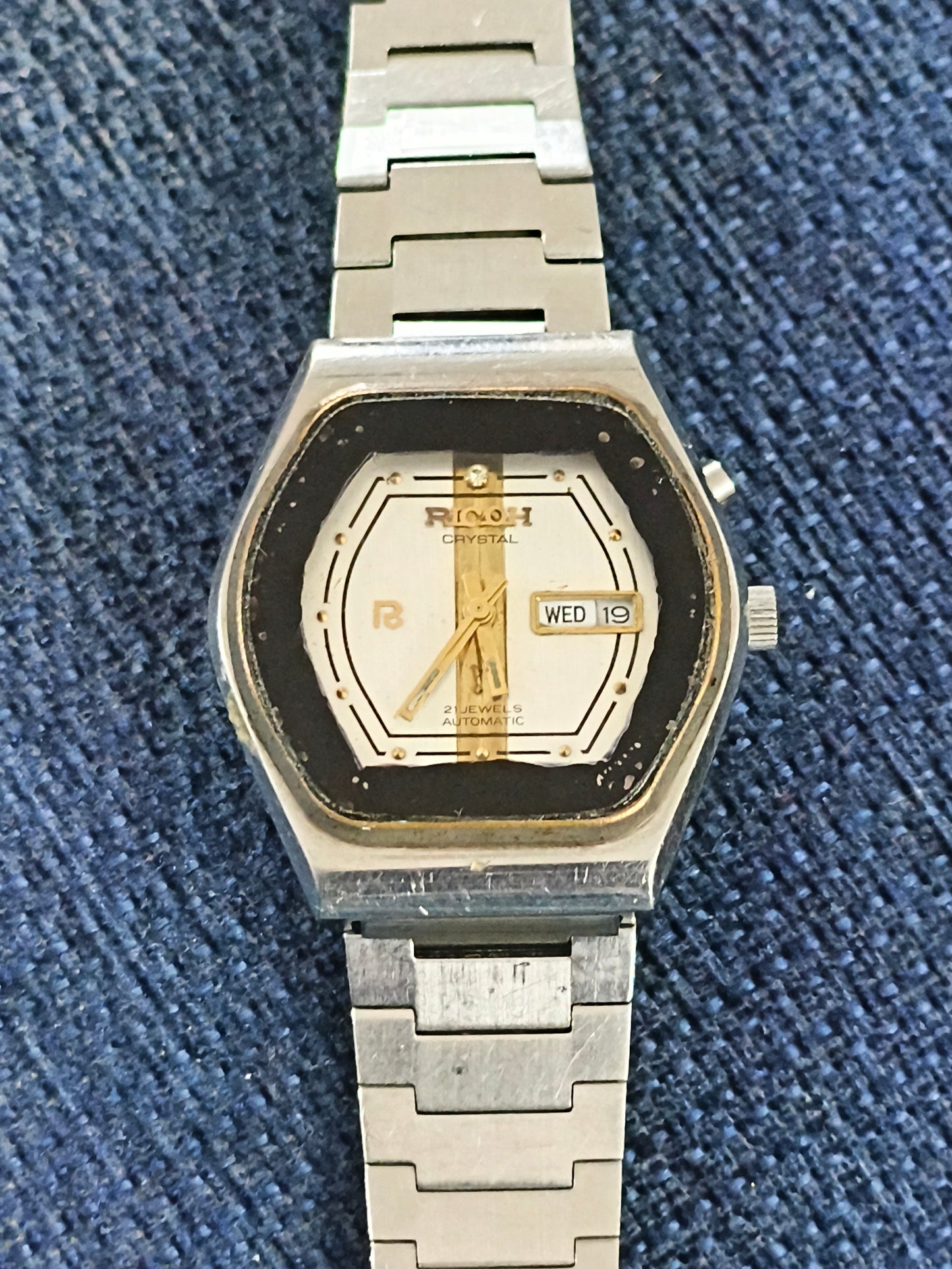 Ricoh Automatic Day Date Vintage Watch with Silver-toned Dial and Golden Vertical Stripes