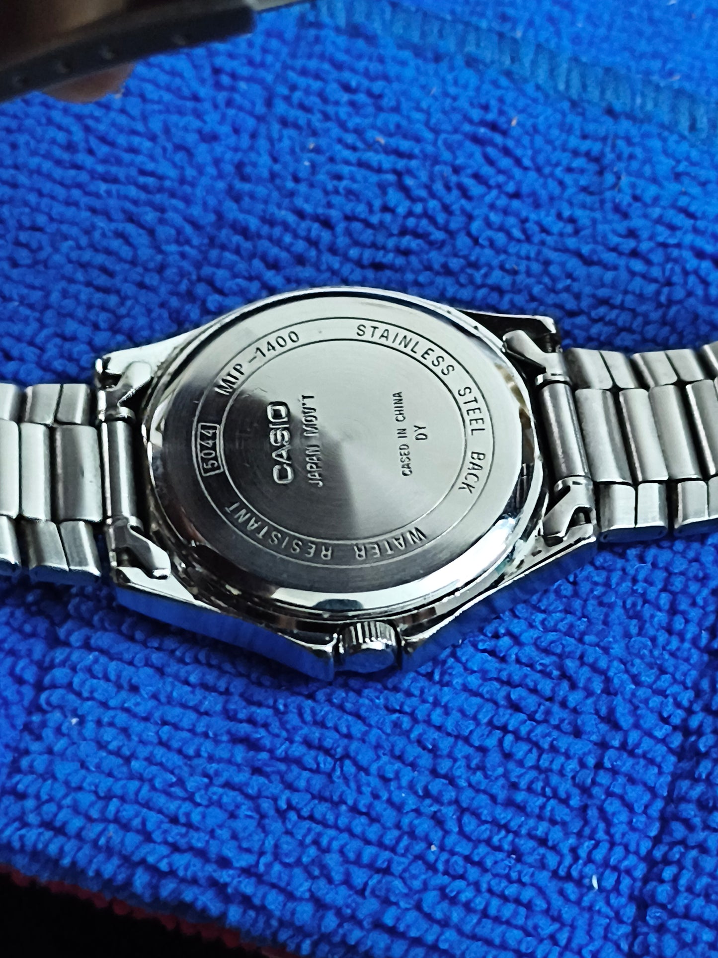Casio MTP-1400D-2ADF Pre-owned Watch with a Midnight Blue Sunburst Dial