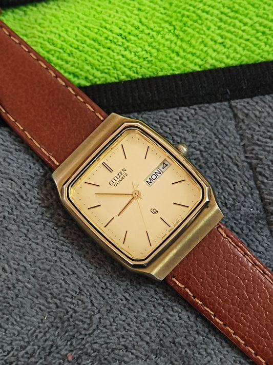 Citizen CQ Quartz “Tank” Gold-toned Watch with Day and Date