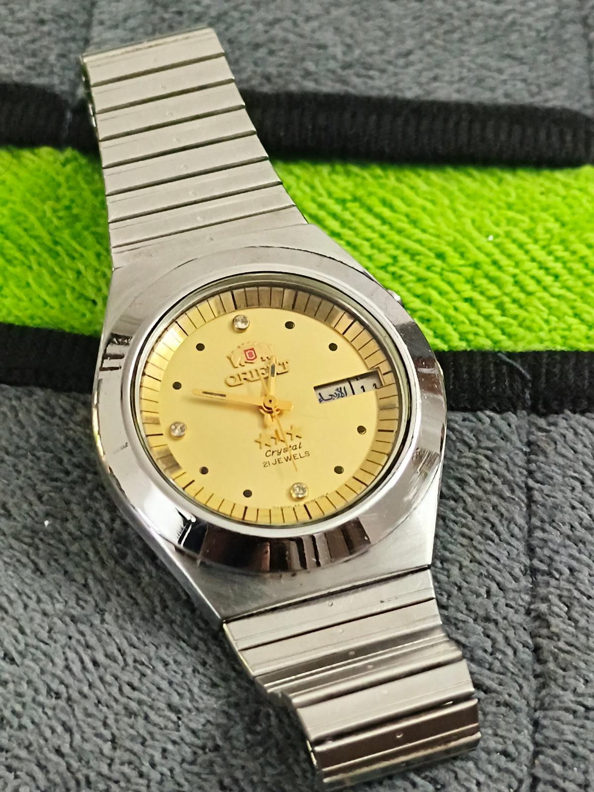 Orient Neo-Vintage Automatic Day Date Watch with a Gold-toned Dial