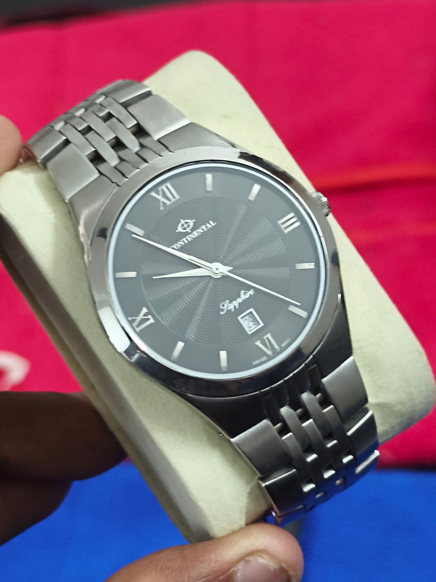 Continental Swiss Made Quartz Watch with a Black Guilloche Dial