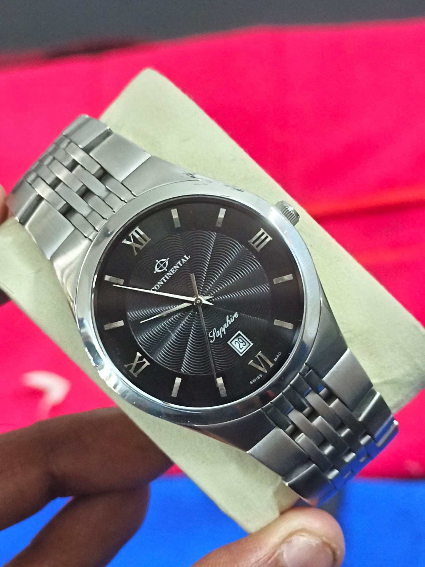 Continental Swiss Made Quartz Watch with a Black Guilloche Dial