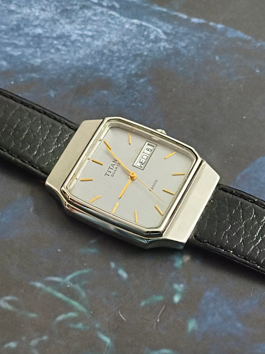 Titan Exacta Tank Quartz Watch with a Textured Grey Dial and Golden Indices