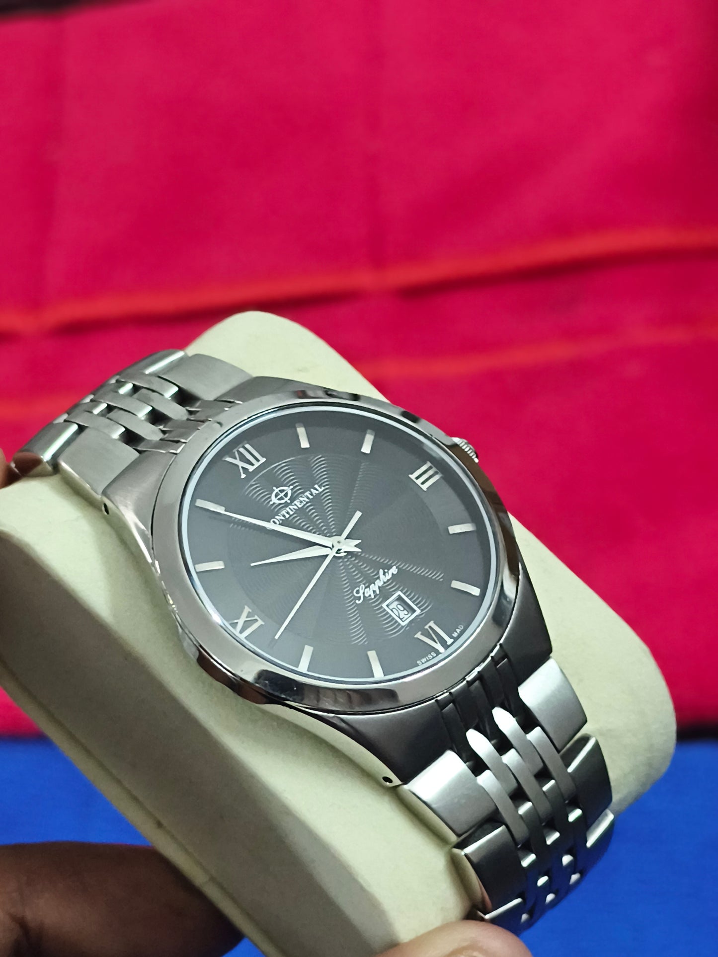 Continental Swiss Made Quartz Watch with a Black Guilloche Dial