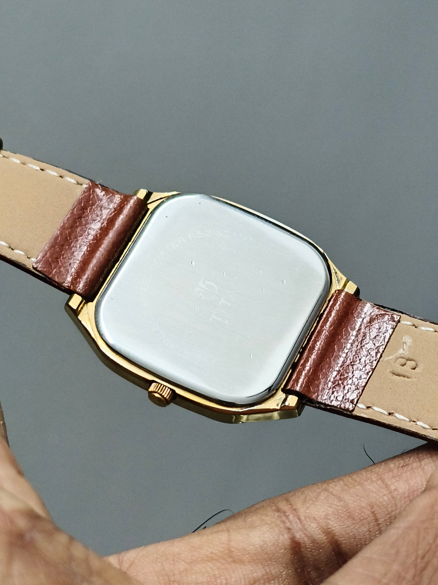 Titan Gold-toned Quartz Day Date Watch with a TV-shaped Case