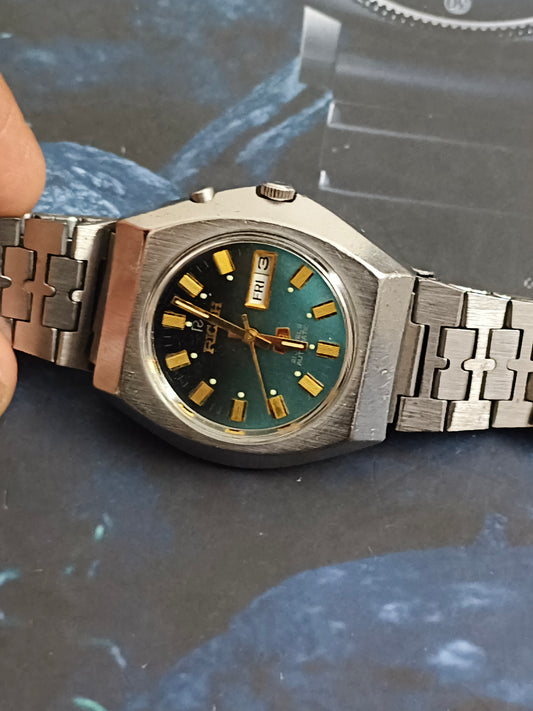 Ricoh Vintage Day Date Automatic Watch with a Black to Blue Gradient Dial