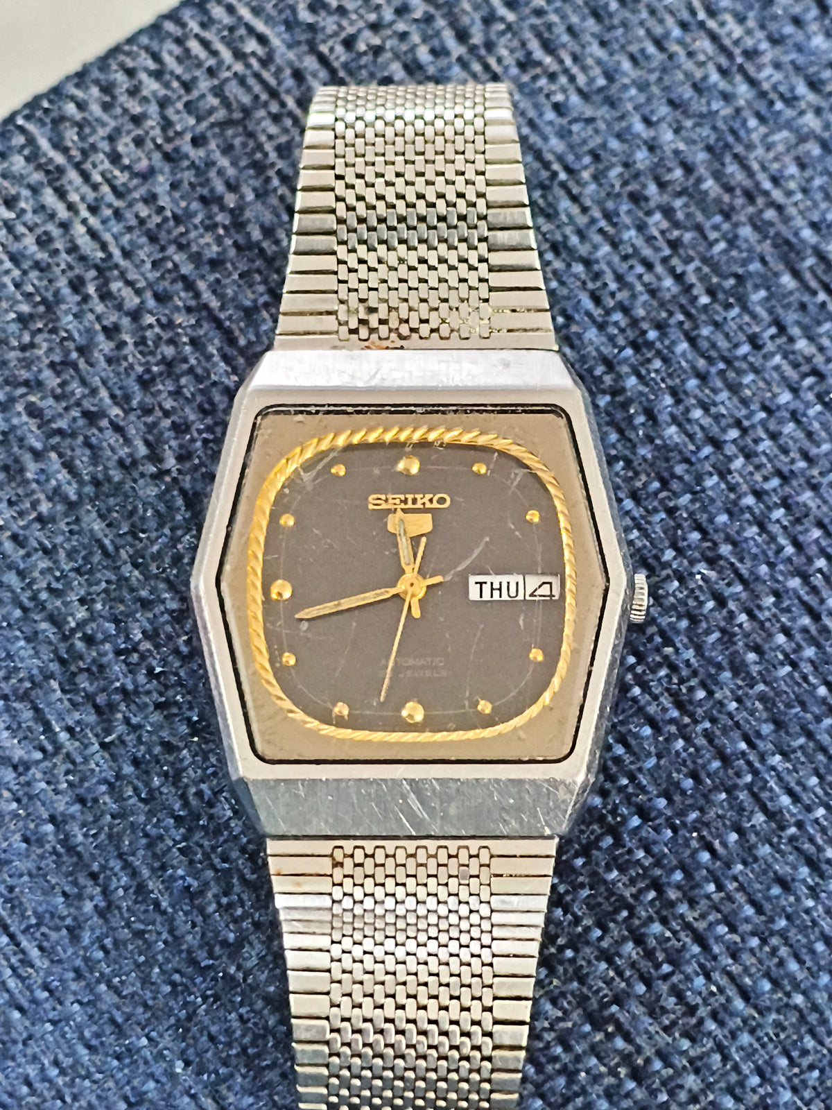 Seiko 5 Automatic Day Date Vintage Watch with a Black Dial and Golden Border