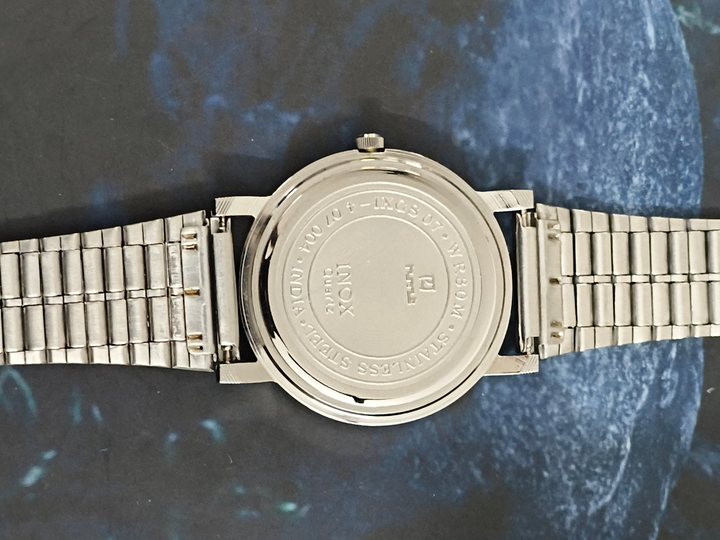 HMT INOX Quartz 35mm Watch with a Black Dial