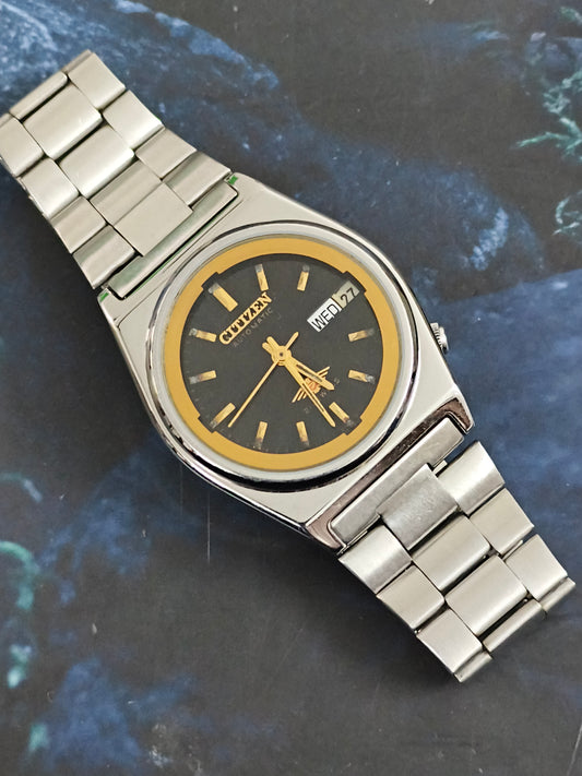 Citizen Vintage Automatic Day Date Watch with a Black Dial and Golden Details