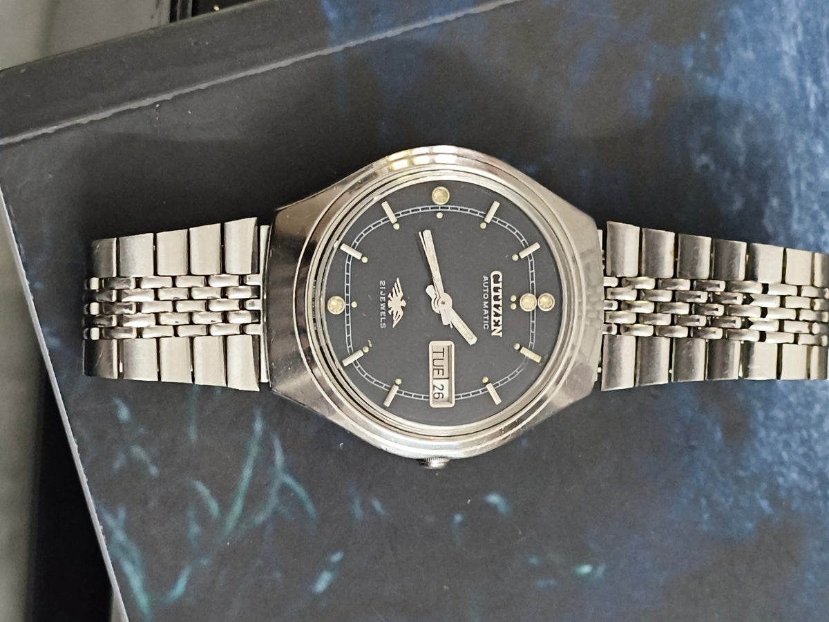 Citizen Vintage Automatic Day Date Watch with a Black Dial