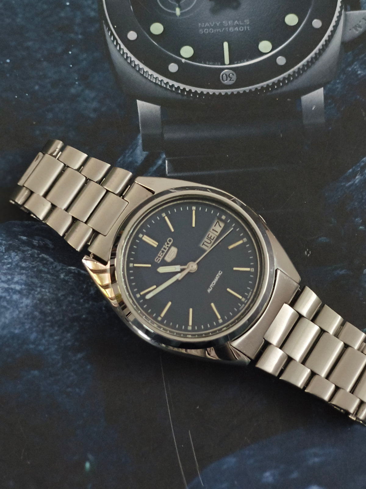 Seiko 5 Automatic Day Date Vintage Watch with a Blue Vertically Brushed Dial