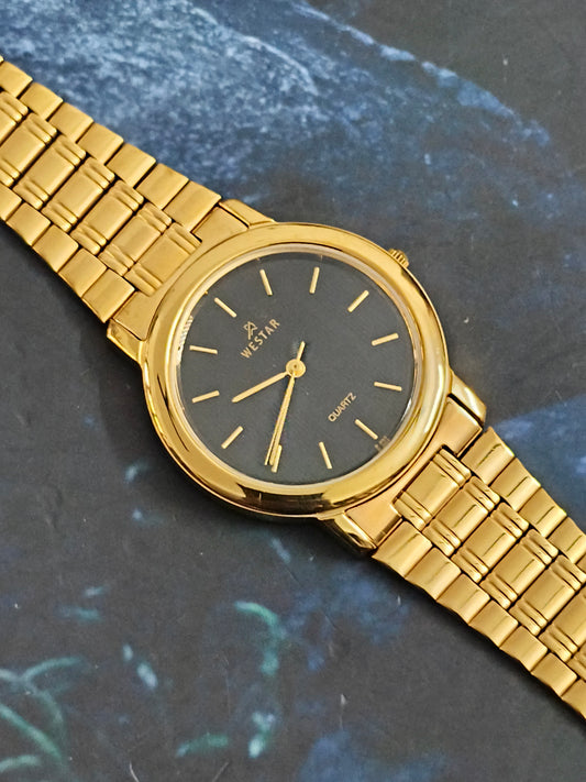 Westar Neo-Vintage Gold-toned Watch with a Black Dial