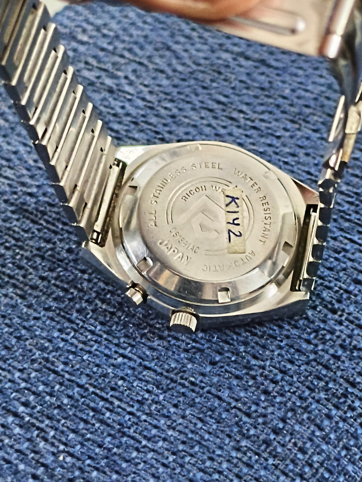 Ricoh Automatic Day Date Vintage Watch with Silver-toned Dial and Golden Vertical Stripes