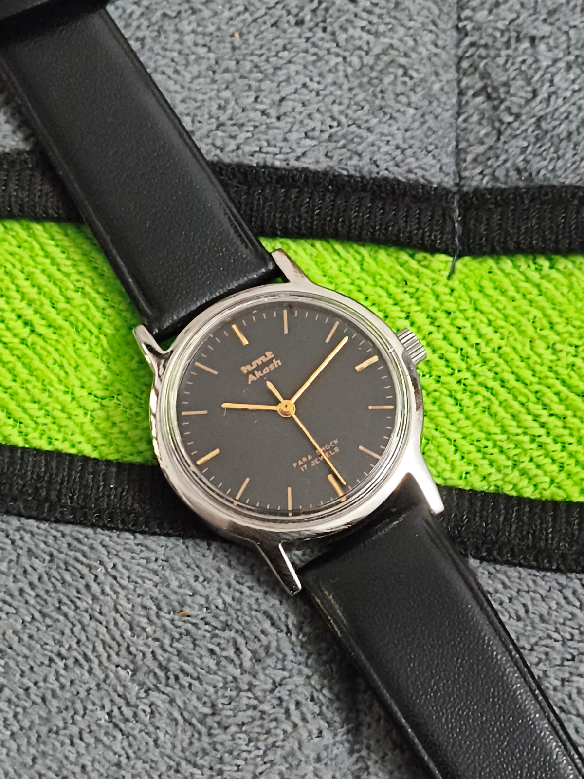 HMT Akash Hand-wound Vintage Watch with a Black Dial and Golden Details