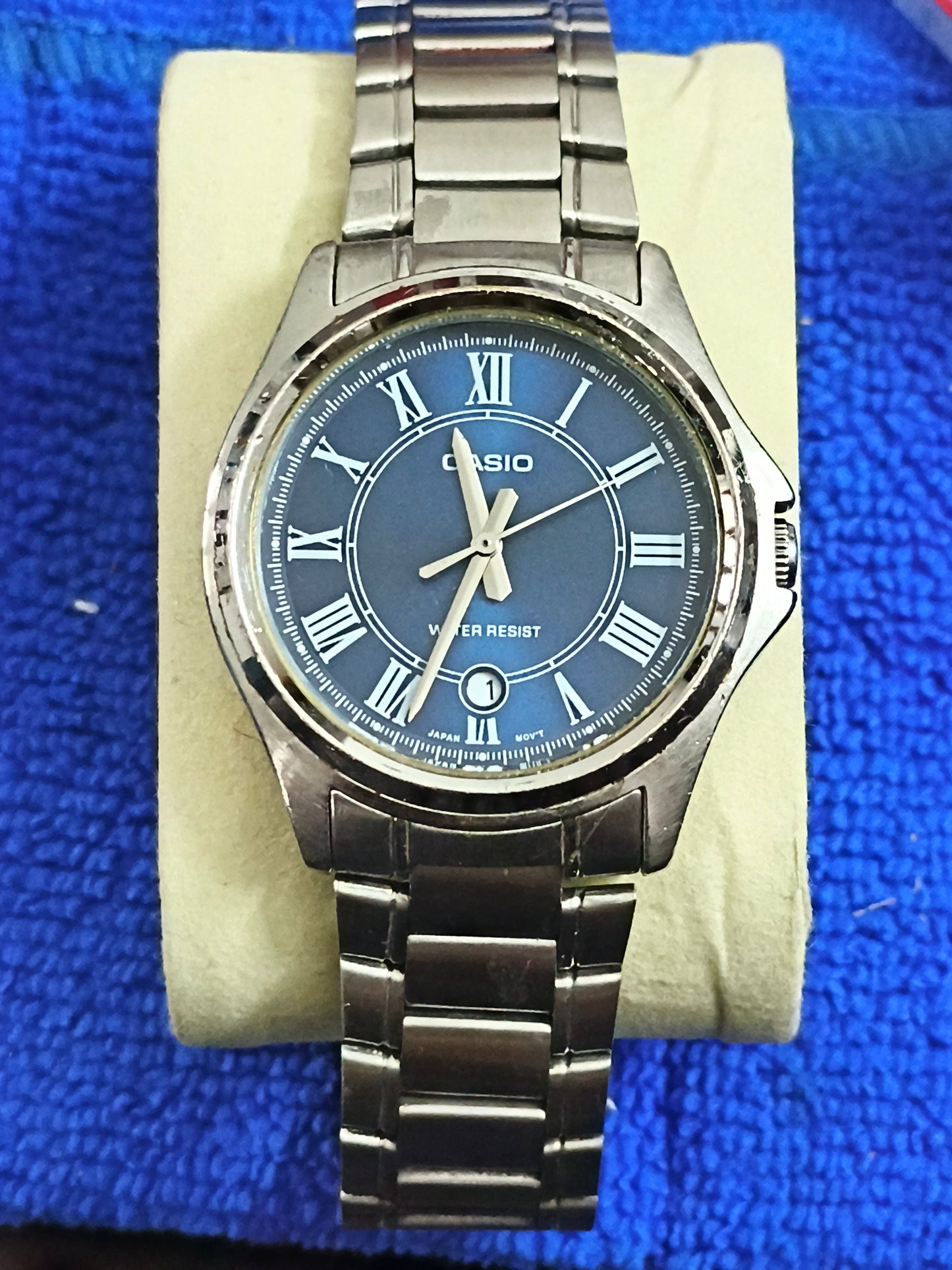 Casio MTP-1400D-2ADF Pre-owned Watch with a Midnight Blue Sunburst Dial