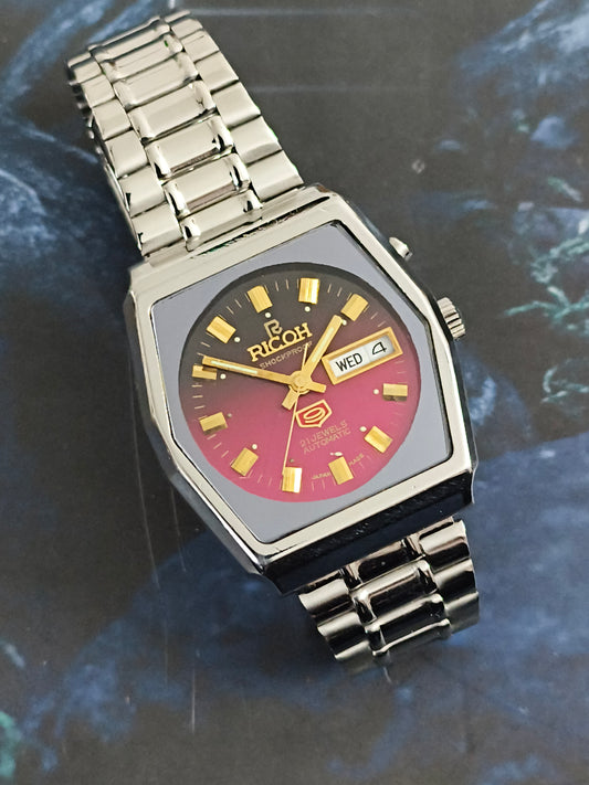 Ricoh Automatic Day Date Vintage Watch with a Black to Burgundy Gradient Dial