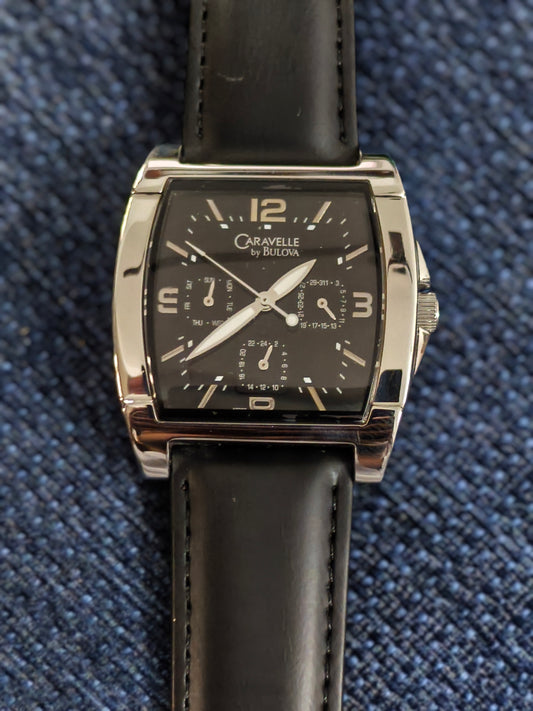Caravelle by Bulova Multifunction Quartz Watch with a Black Dial