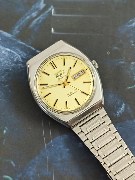 HMT Kajal Deluxe Automatic Day Date Vintage Watch with a Textured Golden Dial