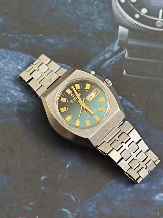 Ricoh Vintage Day Date Automatic Watch with a Black to Blue Gradient Dial