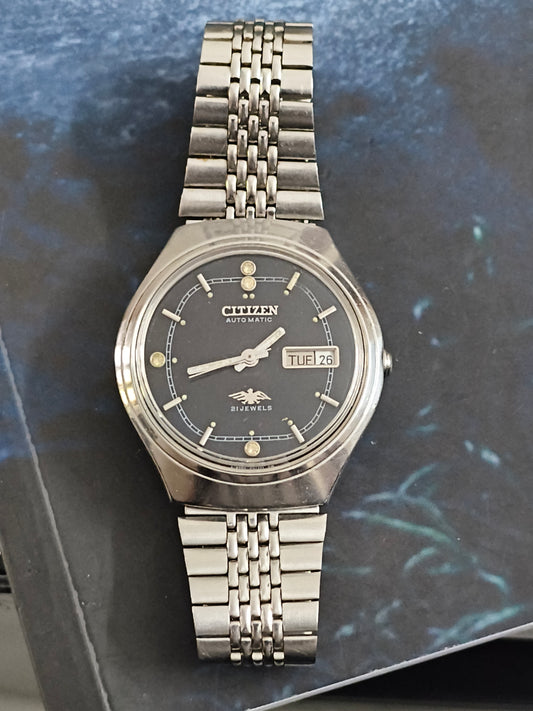 Citizen Vintage Automatic Day Date Watch with a Black Dial